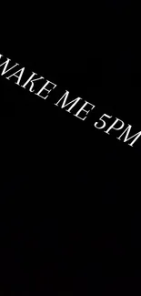 Minimalist black wallpaper with 'Wake Me 5PM' text.