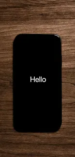 Minimalist phone wallpaper with wooden background and black phone.