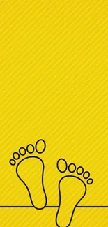 Yellow minimalist wallpaper with black footprints.