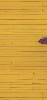 Minimalist yellow wall with umbrella accent.