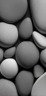 Minimalistic pebble art wallpaper with gray stones.