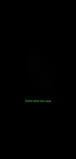 Minimalist black wallpaper with green humorous quote.