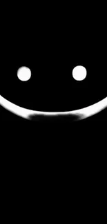 Minimalistic black smiley face wallpaper for phones.