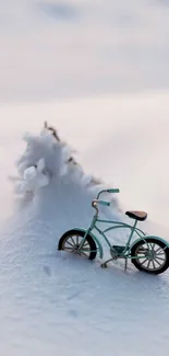 Mint bicycle resting on pristine snow.