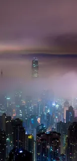 Misty cityscape with colorful night lights and towering skyscrapers.