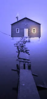 Serene blue wallpaper of a misty dock leading to a house.