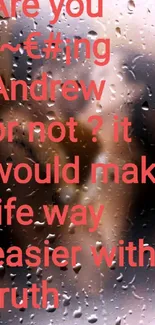 Misty raindrop wallpaper with text on a foggy window.