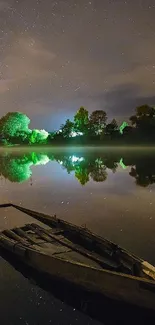 Misty river scene with starry night sky and reflections.