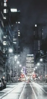 A mysterious misty urban nightscape with city lights and empty street.