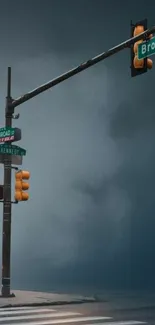 A solitary figure walks on a misty city street corner under traffic lights.