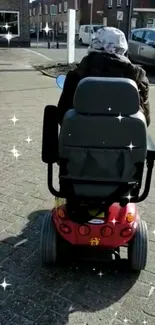 Person on mobility scooter in urban street with sparkles.