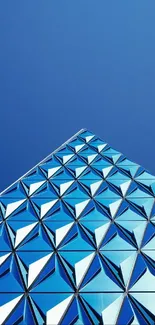 Blue geometric architectural design wallpaper.