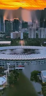 City skyline with modern stadium at sunset.