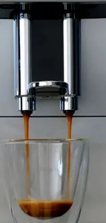 Espresso machine pouring coffee into glass.