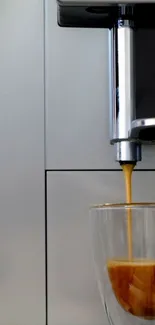 Sleek espresso machine with coffee pouring into a glass cup.