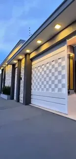 Modern home exterior with elegant evening lighting and contemporary design.