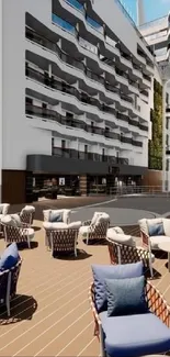 Modern hotel patio with stylish furniture and unique architecture.