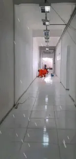 Minimalistic corridor with polished floor and modern fixtures.