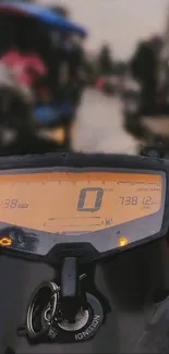 Digital motorcycle dashboard at dusk with glowing display in focus.