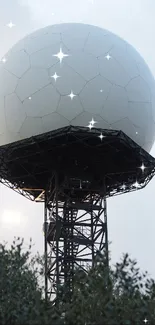 Radar tower with a geometric dome against a cloudy sky.