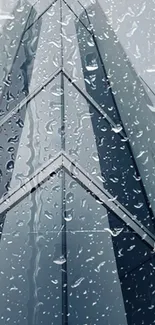 Raindrops on a modern glass building wallpaper.