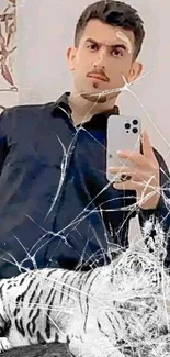 Man in black shirt with smartphone and white tiger overlay.