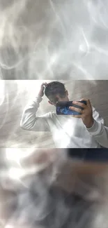 Reflective mirror selfie with smoke and light effects in a modern style.