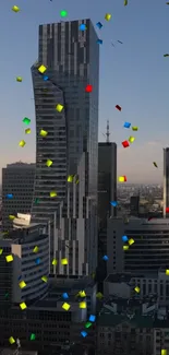 Tall modern skyscraper with colorful confetti in city skyline.