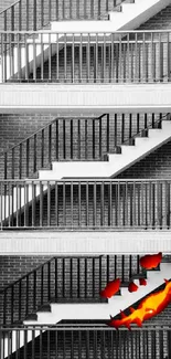 Black and white stairs with vibrant orange highlights in an urban setting.