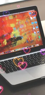 Stylish desk with laptop and phone wallpaper.