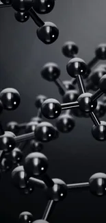 Dark molecular structure wallpaper with black spheres.