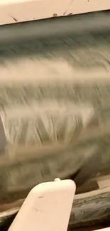 Dynamic image of dollar bills printing on a mobile wallpaper.