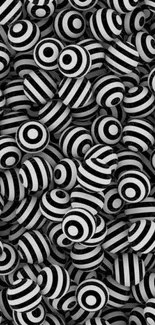 Black and white 3D striped spheres pattern wallpaper.