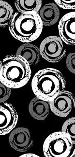 Monochrome abstract circles mobile wallpaper with black, white, and gray tones.