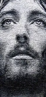 Close-up of a textured monochrome Jesus portrait.