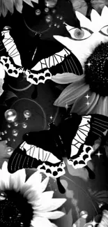 Black and white wallpaper with butterflies and flowers.