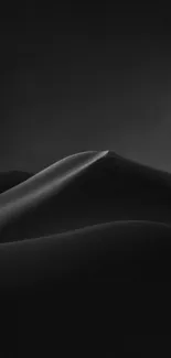 Monochrome desert dunes with elegant curves.