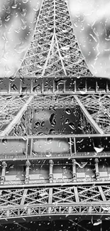 Monochrome wallpaper of Eiffel Tower with rain drops in black and white.