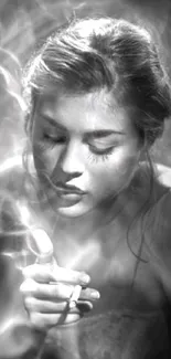 Monochrome portrait of a woman with smoke, exuding elegance and mystery.