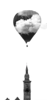 Black and white hot air balloon over historic spire.