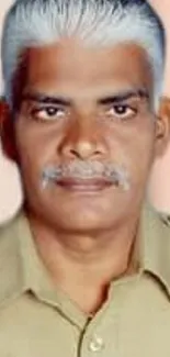 Monochrome portrait of a police officer in uniform.