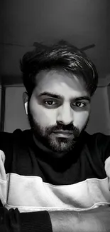 Monochrome portrait of young man in deep thought.