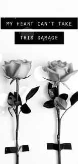 Black and white rose wallpaper with sentimental quote.