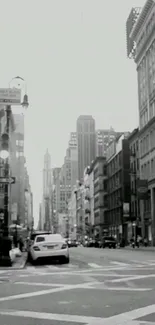 Black and white city street view with urban architecture.