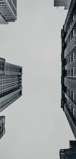 Monochrome urban skyline wallpaper with towering skyscrapers.