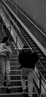 Monochrome urban scene with people on stairs.