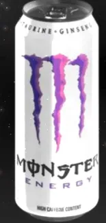 Monster Energy drink can with a black background.