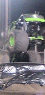 Monster truck performing a high jump with vibrant lime green accents.