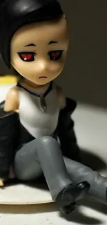 A pensive anime figure with dark hair and red eyes.