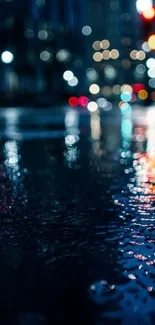 Dark city street at night with rain reflections and blurry lights.